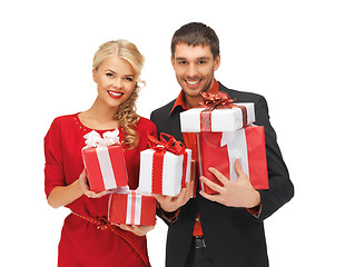 Image showing man and woman with gift boxes