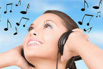 Image showing happy woman in headphones