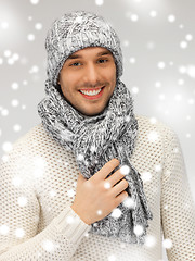 Image showing handsome man in warm sweater, hat and scarf