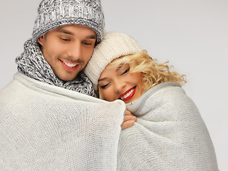 Image showing family couple under warm blanket