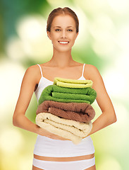 Image showing lovely woman with towels