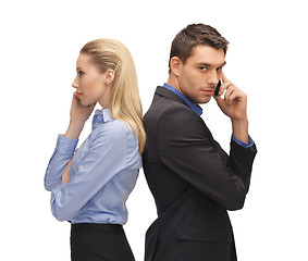 Image showing man and woman with cell phones