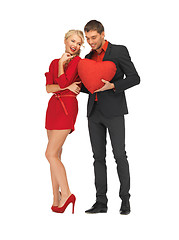 Image showing beautiful couple holding big heart