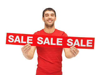 Image showing handsome man with sale sign