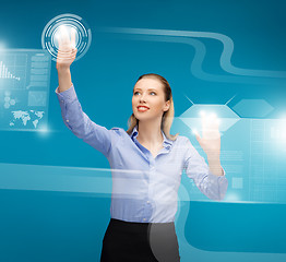 Image showing woman working with virtual screens