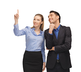 Image showing man and woman pointing their fingers