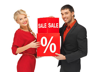 Image showing man and woman with percent sign