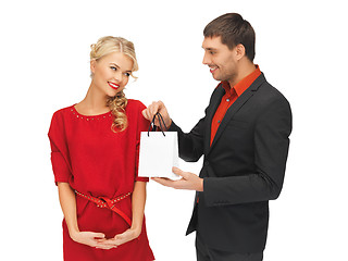 Image showing man and woman with present