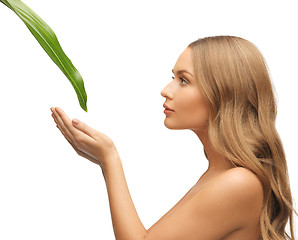 Image showing woman with green leaf