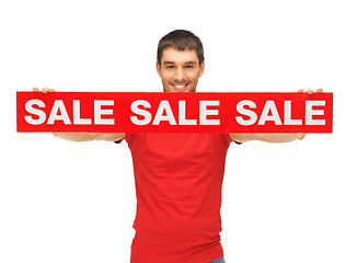 Image showing handsome man with sale sign