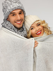 Image showing family couple under warm blanket