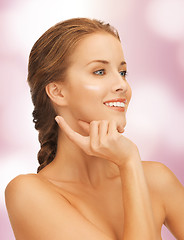 Image showing beautiful woman with moisturizing creme drop