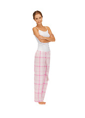 Image showing happy and smiling woman in cotton pajamas