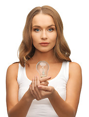 Image showing woman with energy saving bulb