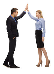 Image showing man and woman giving a high five