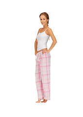 Image showing happy and smiling woman in cotton pajamas