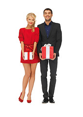 Image showing man and woman with gift boxes