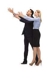 Image showing man and woman making a greeting gesture