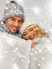 Image showing family couple under warm blanket