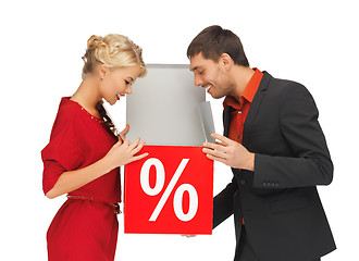 Image showing man and woman with percent sign