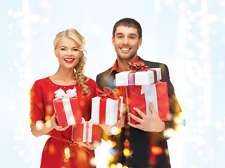 Image showing man and woman with gift boxes