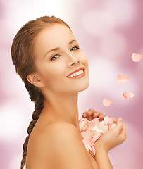 Image showing beautiful woman with rose petals