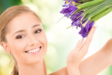 Image showing happy girl with flowers