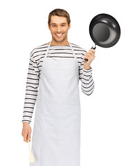 Image showing handsome man with pan and spoon