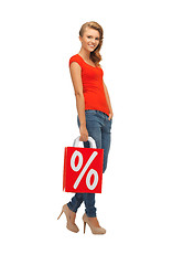 Image showing teenage girl in red t-shirt with shopping bag