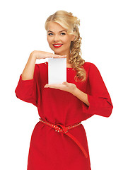 Image showing lovely woman in red dress with note card