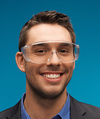 Image showing businessman in protective glasses