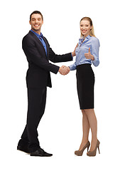 Image showing man and woman shaking their hands