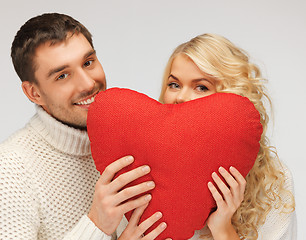 Image showing family couple in a sweaters with heart