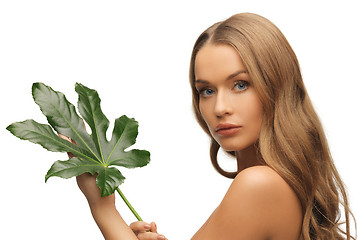 Image showing woman with green leaf