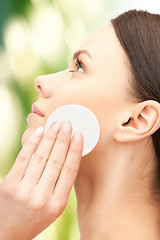 Image showing beautiful woman with cotton pad