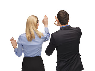 Image showing man and woman working with something imaginary