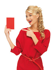 Image showing lovely woman in red dress with note card