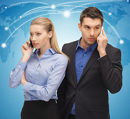 Image showing man and woman with cell phones