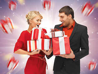 Image showing man and woman with gift boxes