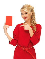 Image showing lovely woman in red dress with note card