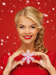 Image showing lovely woman in red dress with snowflake