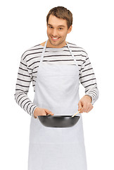 Image showing handsome man with pan and spoon