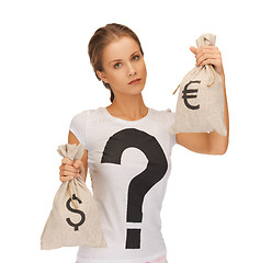 Image showing woman with dollar and euro signed bags