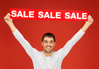 Image showing handsome man with sale sign