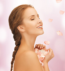 Image showing beautiful woman with rose petals