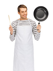 Image showing handsome man with pan and spoon