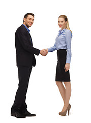 Image showing man and woman shaking their hands