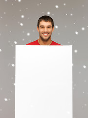 Image showing handsome man with big blank board