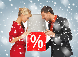 Image showing man and woman with percent sign