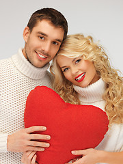 Image showing family couple in a sweaters with heart
